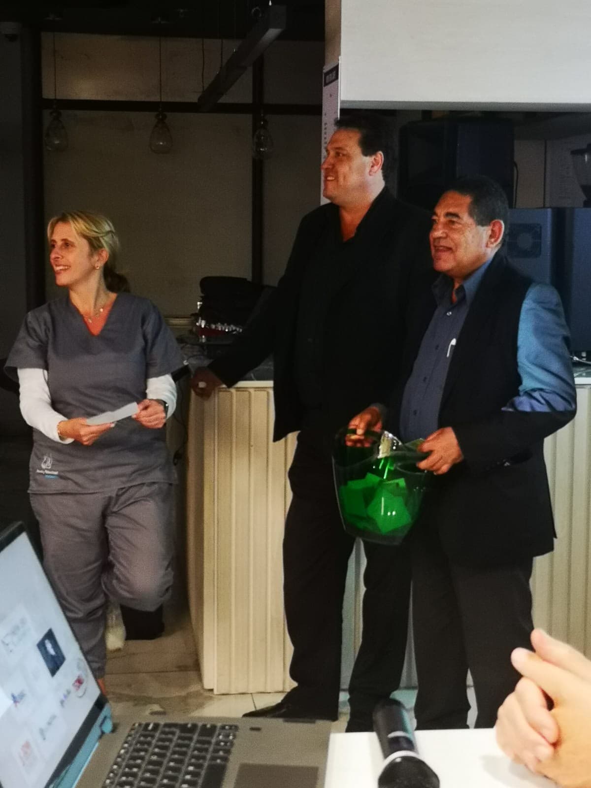 Guests smiling during a lucky draw at a MedTalk Network CME event