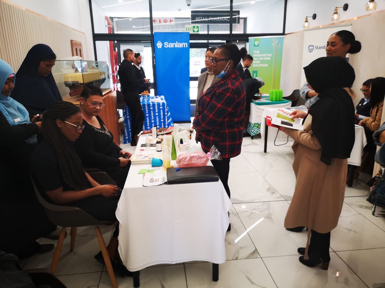 Delegates visiting exhibitor stands at a MedTalk Network wellness day
